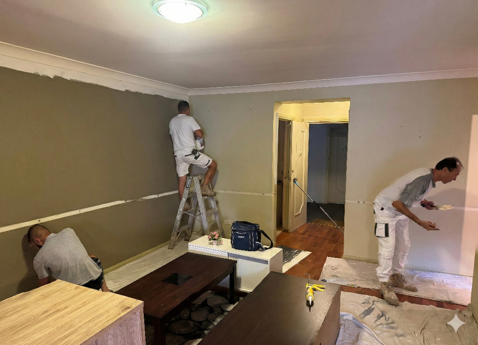 Painter applying paint during an interior repaint